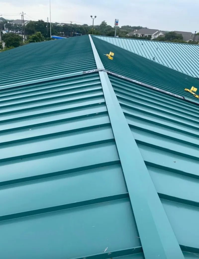 Green commercial metal roof ridge and valley for Metal Roof Repair in Roma